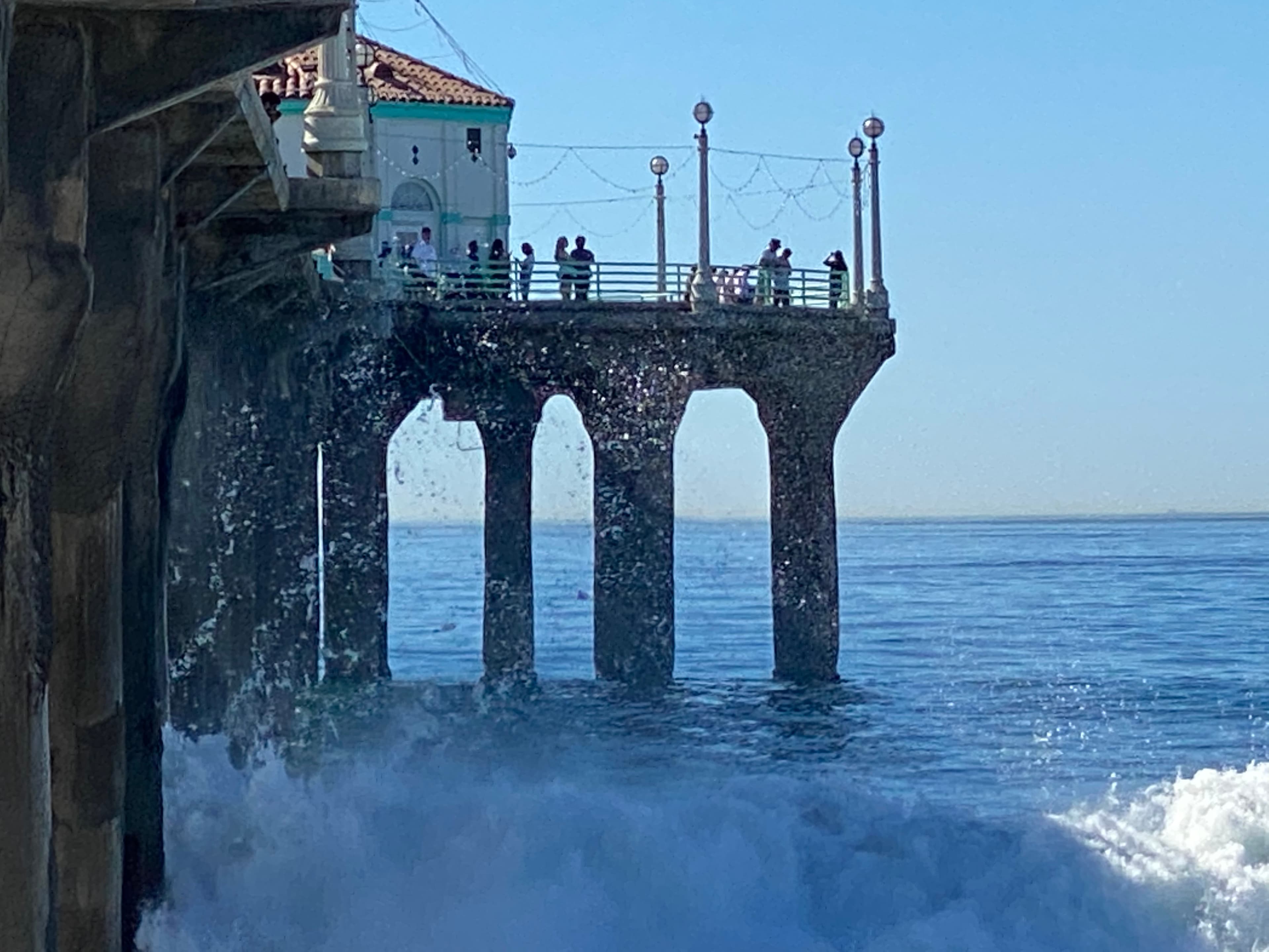 Manhattan Beach Pier with waves crashing - South Bay California